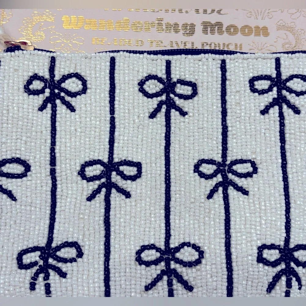 NWT Wandering Moon hand beaded travel pouch with black and white Bow Design
